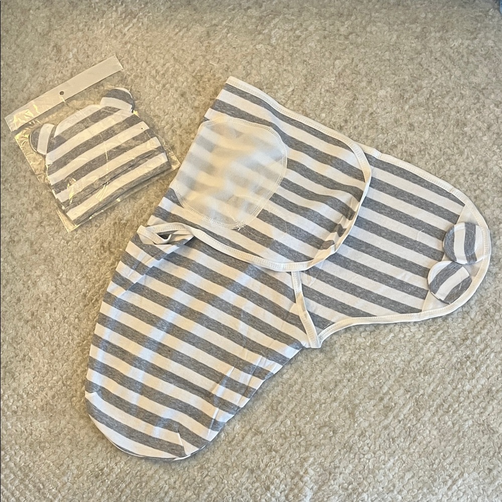 Unbranded swaddle with matching hat
